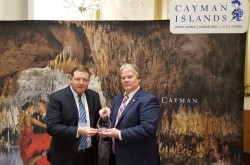 Minister Receives Cayman Airways Caribbean Journal Travelers Choice Award