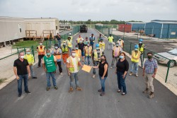 Airfield Upgrade Project Team Donates to Cayman Food Bank