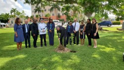 Civil Service plants trees in Memory of Her Late Majesty