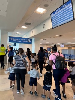 Bodden Town Primary School Students Tour Airport Terminal