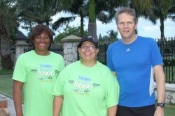 His Excellency the Governor, Duncan Taylor, with Radio Cayman Director Norma McField and Deputy Director Paulette Conolly-Bailey