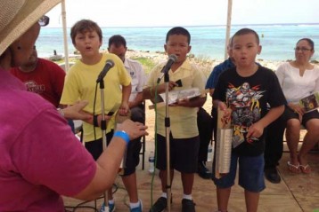 Students from the Little Cayman School Performs for the attendees of the Little Cayman 2014 Agriculture Show.