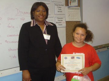 Director Norma McField & a participant in the station's Earth Day PSA writing competition