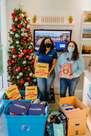 The 2021 Camana Bay Christmas Give is raising funds and collecting food donations for the Cayman Food Bank