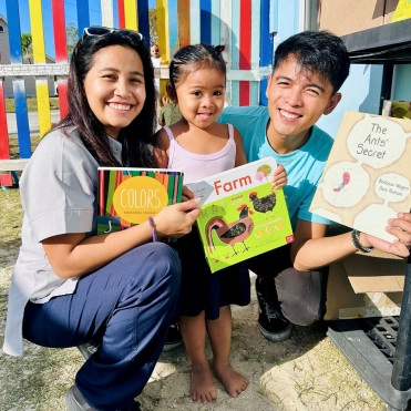 LIFE Celebrates 100,000 Books Donated to the Cayman Islands Community