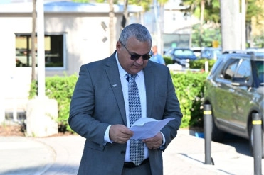 Flag Lowering Ceremony Held for Former MP Austin O. Harris, Jr.