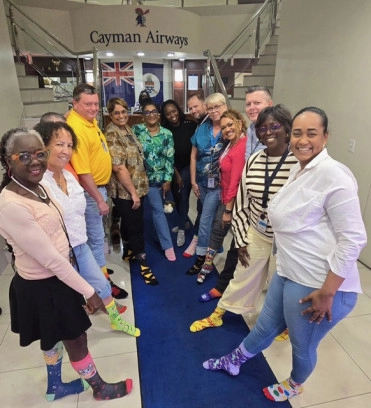 Cayman Airways staff rock their socks for a cause