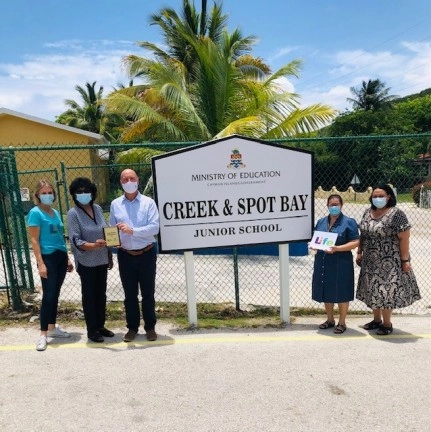 LIFE and Intertrust Group donate 27,734 books to provide class libraries to all public primary schools in Cayman